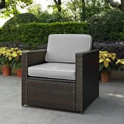 Palm Harbor Outdoor Wicker Arm Chair In Brown With Grey Cushions - 32.5 "W X 29.5 "D X 34.5 "H - 32.5 "W X 29.5 "D X 34.5 "H - Gray
